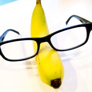 Tite Studio Funny Graphic Banana Selfie Image of Bright Yellow Banana Wearing Black Glasses